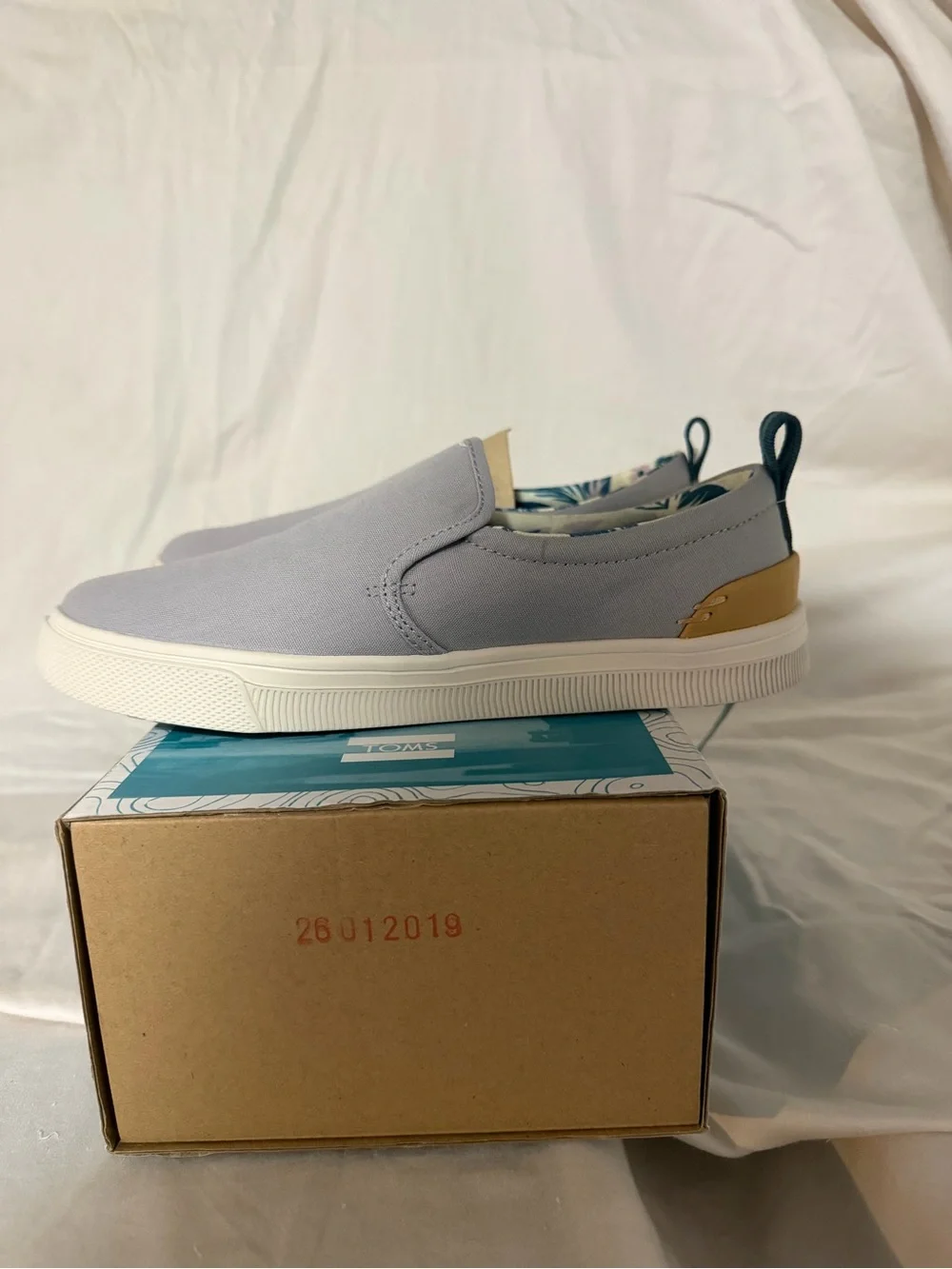 Toms Women’s Slip-On Sneakers in Light Gray and Cream Sole